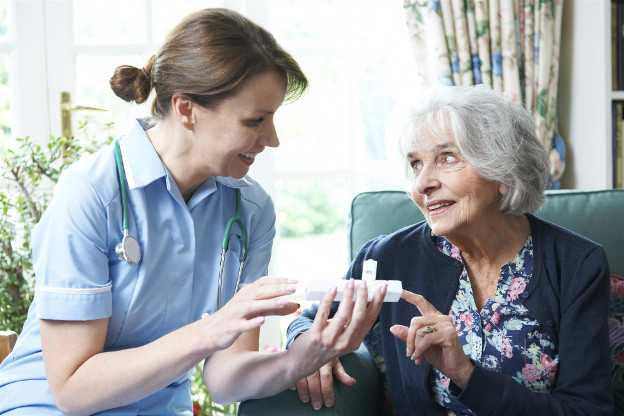 Nurse giving medication